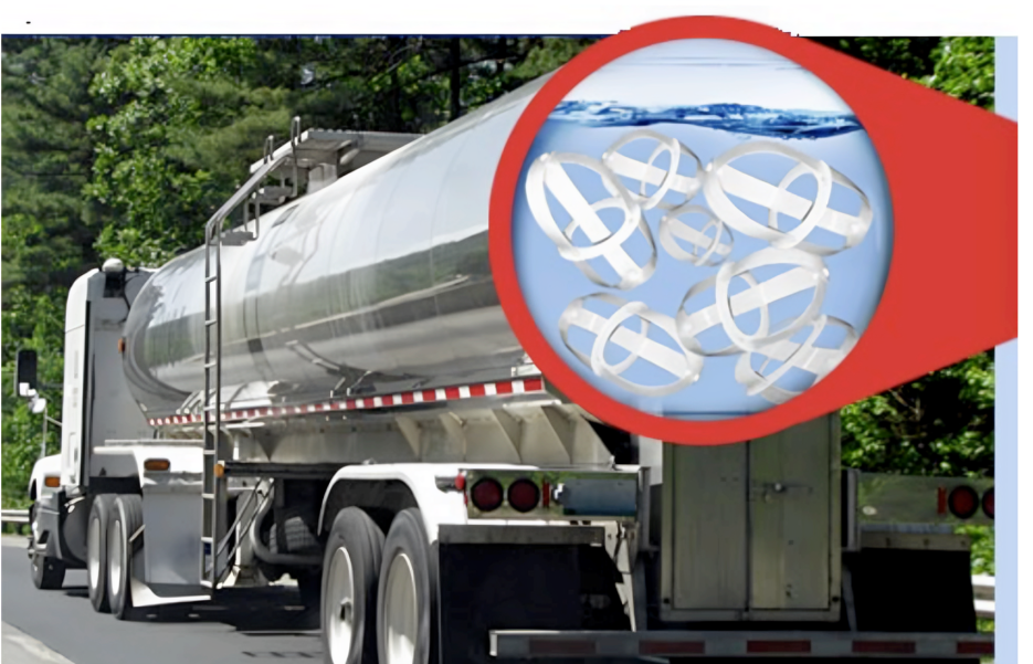 Tanker truck transporting liquid with surge busters floating in water
